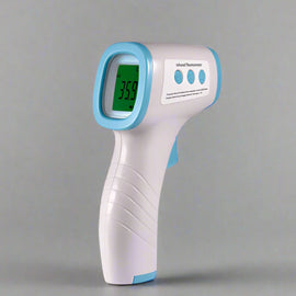 Infrared thermometer on a gray background with promotional text for a showroom.