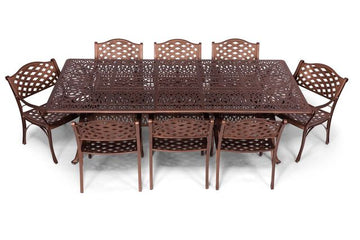 Copper outdoor dining set with a table and eight chairs on a white background