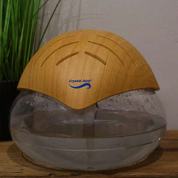 Image of a Crystal Aire New-Look S2 Standard Air Purifier Natural Wood out of packaging