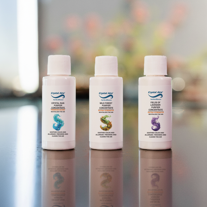 Image of a Crystal Aire 30ml Crystal Rain, Lavendar & Wild Forest Air Purifier Concentrates 3 Pack out of packaging
